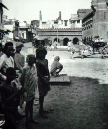 a market place. people looking at camera